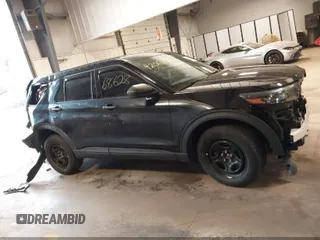 2023 Ford Police Interceptor Utility z VIN 1FM5K8AB1PGA03761, wystawiony jako IAAI lot #42068628 z przebiegiem 39 009 mil mil oraz . Historia ofert i sprzedaży dostępna na DreamBid. Obrazek 1.