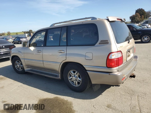 2001 Lexus LX 470 z VIN JTJHT00W213507042, wystawiony jako Copart lot #52634195 z przebiegiem 179 707 mil mil oraz Tytuł czysty. Historia ofert i sprzedaży dostępna na DreamBid. Obrazek 2.