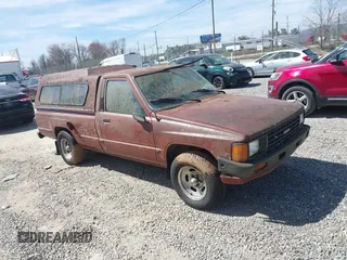 1985 Toyota Pickup z VIN JT4RN55R8F0075812, wystawiony jako IAAI lot #41824106 z przebiegiem 163 794 mil mil oraz . Historia ofert i sprzedaży dostępna na DreamBid. Obrazek 1.