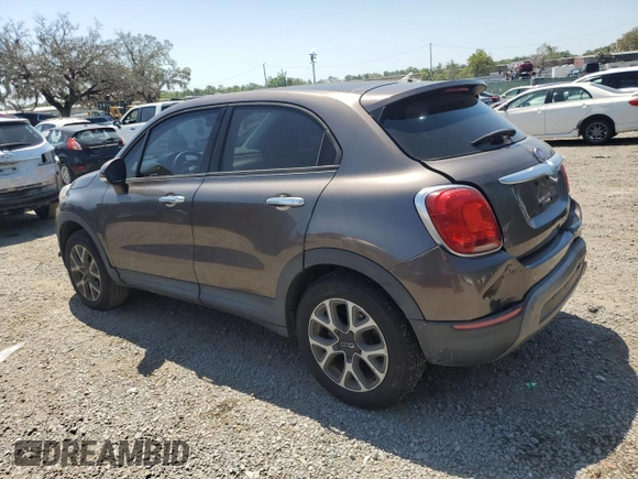 2016 FIAT 500X Trekking with VIN ZFBCFYCT0GP338212, listed as a Copart auction lot 51843725 with 56,157 mi miles and Salvage title. Bid and sale history available at DreamBid. Image 2.