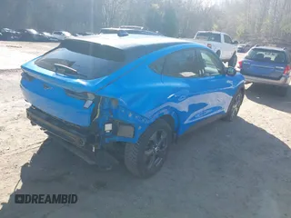 2023 Ford Mustang Mach-E Select z VIN 3FMTK1SS3PMA28535, wystawiony jako IAAI lot #42127075 z przebiegiem 28 092 mil mil oraz . Historia ofert i sprzedaży dostępna na DreamBid. Obrazek 4.