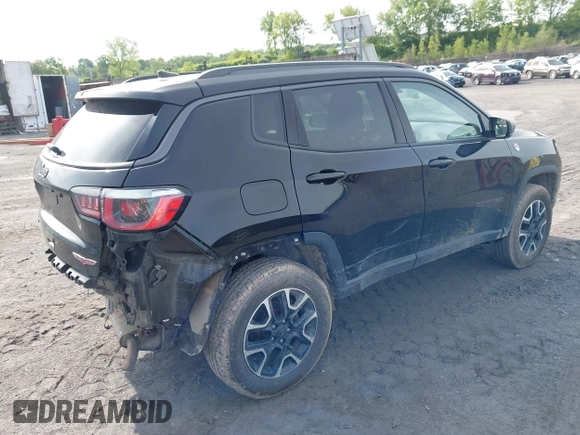 2020 Jeep Compass Trailhawk z VIN 3C4NJDDB7LT195317, wystawiony jako IAAI lot #42325122 z przebiegiem 97 858 mil mil oraz . Historia ofert i sprzedaży dostępna na DreamBid. Obrazek 4.