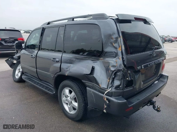 2004 Toyota Land Cruiser with VIN JTEHT05JX42059414, listed as a IAAI auction lot 41919791 with 210,528 mi miles. Bid and sale history available at carsss.com. Image 3.