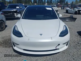 2018 Tesla Model 3 Long Range Battery with VIN 5YJ3E1EA7JF020173, listed as a IAAI auction lot 42046312 with 83,395 mi miles and . Bid and sale history available at DreamBid. Image 13.