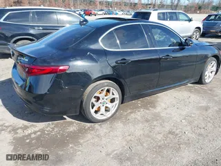 2021 Alfa Romeo Giulia Ti with VIN ZARFANBN1M7649953, listed as a IAAI auction lot 41591153 with 16,672 mi miles. Bid and sale history available at carsss.com. Image 4.