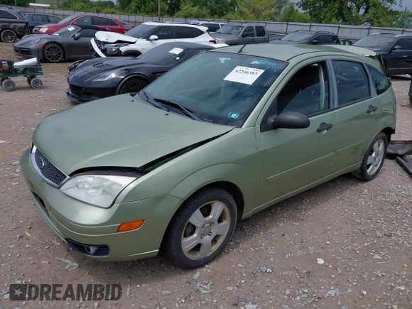 2007 Ford Focus S z VIN 1FAHP37N47W278284, wystawiony jako IAAI lot #42246383 z przebiegiem 164 830 mil mil oraz . Historia ofert i sprzedaży dostępna na DreamBid. Obrazek 2.