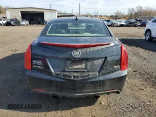 2013 Cadillac ATS Performance z VIN 1G6AJ5S36D0122926, wystawiony jako Copart lot #78393634 z przebiegiem 162 061 mil mil oraz Szkody całkowita. Historia ofert i sprzedaży dostępna na DreamBid. Obrazek 6.