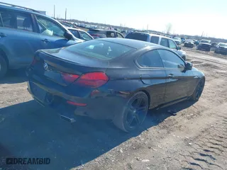 2012 BMW 6 Series 650i xDrive with VIN WBALX5C59CC894030, listed as a IAAI auction lot 41763126 with 115,562 mi miles. Bid and sale history available at carsss.com. Image 4.