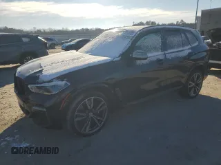 2023 BMW X5 M50i z VIN 5UXJU4C03P9R22942, wystawiony jako Copart lot #42009955 z przebiegiem Nie podano mil oraz Szkoda całkowita • Salvage title. Historia ofert i sprzedaży dostępna na DreamBid. Obrazek 1.
