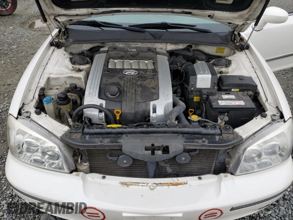 2004 Hyundai XG z VIN KMHFU45E74A301113, wystawiony jako Copart lot #46635495 z przebiegiem 104 776 mil mil oraz Szkoda całkowita • Salvage title. Historia ofert i sprzedaży dostępna na DreamBid. Obrazek 11.