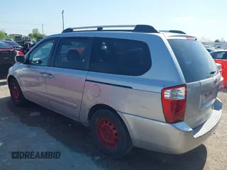 2006 Kia Sedona LX with VIN KNDMB233266036243, listed as a IAAI auction lot 41929441 with 202,851 mi miles. Bid and sale history available at carsss.com. Image 3.