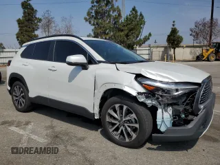 2023 Toyota Corolla Cross XLE with VIN 7MUDAAAG2PV042957, listed as a Copart auction lot 60301555 with 39,211 mi miles and Salvage title. Bid and sale history available at DreamBid. Image 4.