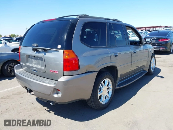 2008 GMC Envoy Denali with VIN 1GKET63M082201867, listed as a IAAI auction lot 41874803 with 218,639 mi miles. Bid and sale history available at carsss.com. Image 4.