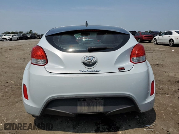 2015 Hyundai Veloster z VIN KMHTC6AD2FU221623, wystawiony jako Copart lot #58222615 z przebiegiem 176 801 mil mil oraz Czysty tytuł • Clean title. Historia ofert i sprzedaży dostępna na DreamBid. Obrazek 6.