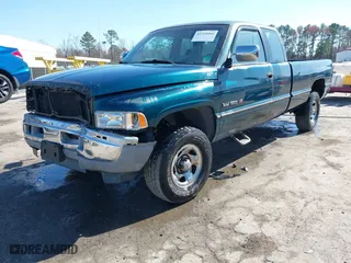 1996 Dodge Ram 1500 with VIN 3B7HF13Z8TG121571, listed as a IAAI auction lot 41759066 with 157,129 mi miles. Bid and sale history available at carsss.com. Image 2.