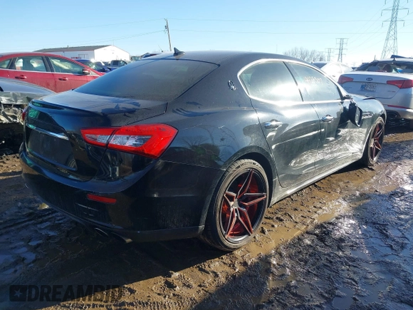 2014 Maserati Ghibli z VIN ZAM57XSA4E1090315, wystawiony jako IAAI lot #41423507 z przebiegiem 115 323 mil mil oraz . Historia ofert i sprzedaży dostępna na DreamBid. Obrazek 4.