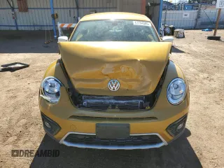 2016 Volkswagen Beetle Dune z VIN 3VWS17AT8GM629176, wystawiony jako Copart lot #47794085 z przebiegiem Nie podano mil oraz Szkody całkowita. Historia ofert i sprzedaży dostępna na DreamBid. Obrazek 5.