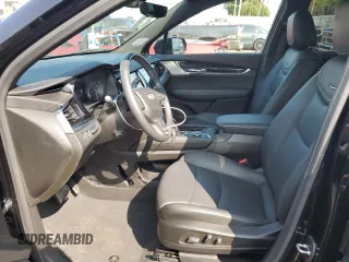 2023 Cadillac XT6 AWD Premium Luxury with VIN 1GYKPDRS6PZ185431, listed as a Copart auction lot 70475734 with 11,276 mi miles and Salvage Title. Bid and sale history available at carsss.com. Image 7.