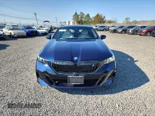 2024 BMW i5 eDrive40 z VIN WBY33FK03RCR31834, wystawiony jako Copart lot #76007834 z przebiegiem 60 mil mil oraz Szkody całkowita. Historia ofert i sprzedaży dostępna na DreamBid. Obrazek 5.