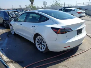 2023 Tesla Model 3 with VIN 5YJ3E1EA9PF640015, listed as a IAAI auction lot 41622086 with 15,622 mi miles and . Bid and sale history available at carsss.com. Image 3.