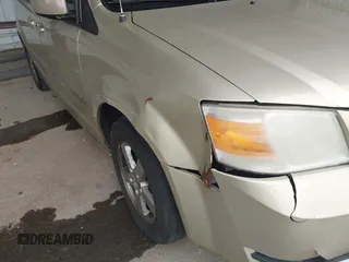 2010 Dodge Grand Caravan SXT with VIN 2D4RN5D17AR496854, listed as a IAAI auction lot 42210738 with 213,121 mi miles and . Bid and sale history available at DreamBid. Image 6.