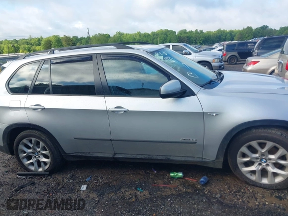 2012 BMW X5 35i z VIN 5UXZV4C56CL749457, wystawiony jako IAAI lot #42250854 z przebiegiem 153 968 mil mil oraz . Historia ofert i sprzedaży dostępna na DreamBid. Obrazek 14.