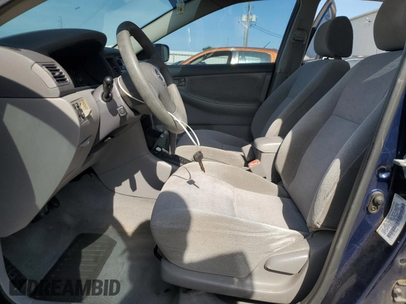 2004 Toyota Corolla CE with VIN 1NXBR32E64Z219676, listed as a Copart auction lot 54433135 with 187,495 mi miles and Salvage Title. Bid and sale history available at DreamBid. Image 7.