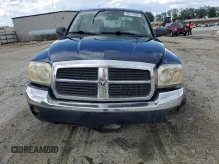 2005 Dodge Dakota SLT with VIN 1D7HE48NX5S308595, listed as a Copart auction lot 56713434 with 257,419 mi miles and Salvage Title. Bid and sale history available at carsss.com. Image 5.