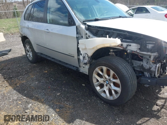 2012 BMW X5 35i с VIN 5UXZV4C56CL986384, выставлен на аукционе IAAI как лот 41986665 с пробегом Не указан миль и . История ставок и продаж доступна на DreamBid. Изображение 20.