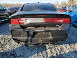 2012 Dodge Charger SXT with VIN 2C3CDXHG2CH204928, listed as a Copart auction lot 49602115 with 210,923 mi miles and Salvage Title. Bid and sale history available at carsss.com. Image 6.
