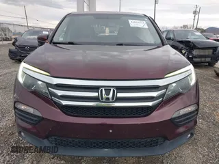 2016 Honda Pilot EX-L with VIN 5FNYF6H58GB072368, listed as a IAAI auction lot 41055222 with 130,813 mi miles. Bid and sale history available at carsss.com. Image 12.