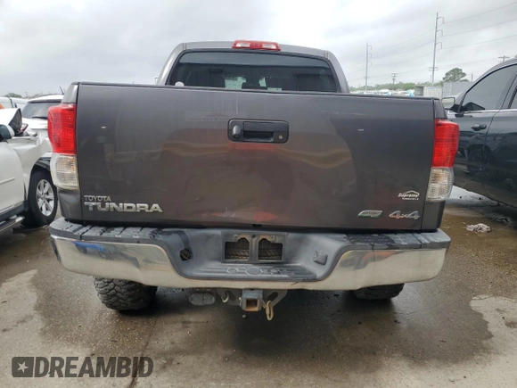 2013 Toyota Tundra с VIN 5TFDW5F13DX297551, выставлен на аукционе Copart как лот 51638505 с пробегом 116 812 миль миль и Списание • Salvage title. История ставок и продаж доступна на DreamBid. Изображение 6.