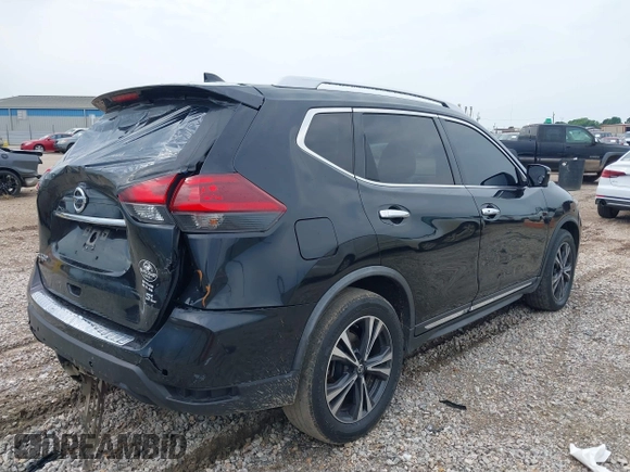 2018 Nissan Rogue SV with VIN JN8AT2MT8JW465012, listed as a IAAI auction lot 39376292 with 184,861 mi miles and . Bid and sale history available at DreamBid. Image 4.