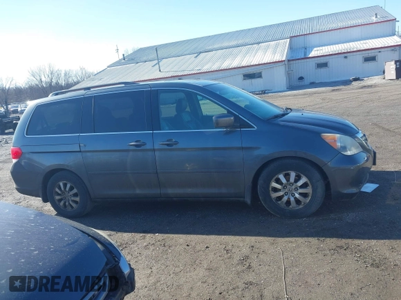 2010 Honda Odyssey EX-L with VIN 5FNRL3H68AB038541, listed as a IAAI auction lot 41813473 with 206,914 mi miles. Bid and sale history available at carsss.com. Image 13.