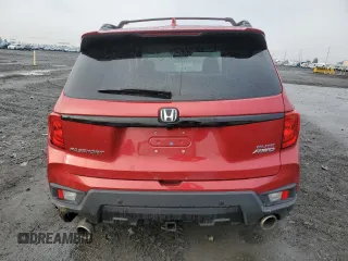 2023 Honda Passport Elite with VIN 5FNYF8H09PB016410, listed as a Copart auction lot 85071544 with 54,327 mi miles and Salvage Title. Bid and sale history available at carsss.com. Image 6.