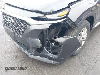 2020 Hyundai Santa Fe SE with VIN 5NMS2CAD8LH258275, listed as a IAAI auction lot 41912687 with 80,467 mi miles and . Bid and sale history available at DreamBid. Image 6.