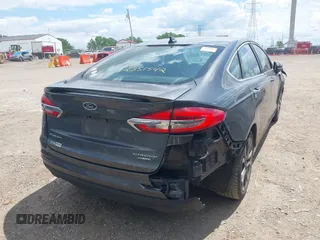 2020 Ford Fusion Titanium with VIN 3FA6P0RUXLR182120, listed as a IAAI auction lot 42351542 with 141,746 mi miles and . Bid and sale history available at DreamBid. Image 4.
