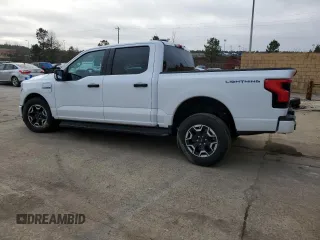 2023 Ford F-150 Lightning Pro z VIN 1FTVW1ELXPWG63466, wystawiony jako Copart lot #43397005 z przebiegiem 8 852 mil mil oraz Szkoda całkowita • Salvage title. Historia ofert i sprzedaży dostępna na DreamBid. Obrazek 2.