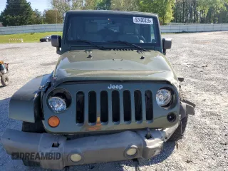 2008 Jeep Wrangler Unlimited Sahara with VIN 1J4GA59148L504608, listed as a Copart auction lot 52400325 with 123,959 mi miles and Salvage Title. Bid and sale history available at carsss.com. Image 5.
