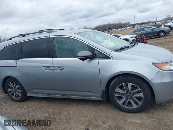 2016 Honda Odyssey Touring Elite with VIN 5FNRL5H99GB107896, listed as a IAAI auction lot 42040395 with 162,120 mi miles and . Bid and sale history available at carsss.com. Image 13.