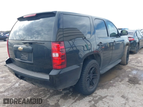 2011 Chevrolet Tahoe Commercial with VIN 1GNLC2E00BR325388, listed as a IAAI auction lot 41472731 with 265,781 mi miles and . Bid and sale history available at DreamBid. Image 4.