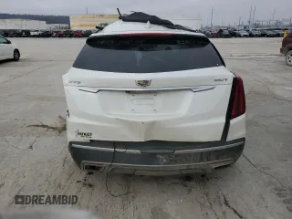 2021 Cadillac XT5 FWD Premium Luxury z VIN 1GYKNCR41MZ154357, wystawiony jako Copart lot #86819564 z przebiegiem Nie podano mil oraz Nie do naprawy • Non repairable. Historia ofert i sprzedaży dostępna na DreamBid. Obrazek 6.