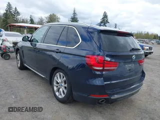 2015 BMW X5 xDrive35d with VIN 5UXKS4C55F0J98874, listed as a IAAI auction lot 42030583 with 151,079 mi miles. Bid and sale history available at carsss.com. Image 3.