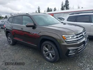 2019 Volkswagen Atlas SE z VIN 1V2XR2CA5KC545213, wystawiony jako IAAI lot #41753004 z przebiegiem 128 128 mil mil oraz . Historia ofert i sprzedaży dostępna na DreamBid. Obrazek 1.