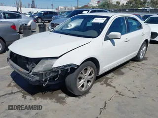 2012 Ford Fusion SE with VIN 3FAHP0HG1CR419324, listed as a IAAI auction lot 41832151 with 143,474 mi miles and . Bid and sale history available at DreamBid. Image 2.