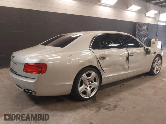 2015 Bentley Flying Spur V8 with VIN SCBET9ZAXFC042716, listed as a IAAI auction lot 42621840 with 47,299 mi miles and . Bid and sale history available at DreamBid. Image 4.
