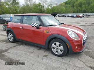 2014 MINI Hardtop with VIN WMWXM5C52ET934803, listed as a Copart auction lot 55284765 with 96,519 mi miles and Salvage title. Bid and sale history available at DreamBid. Image 4.