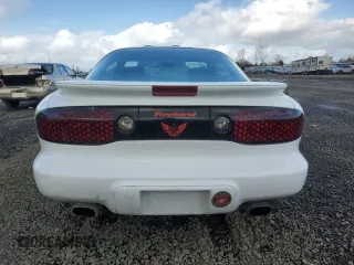 2001 Pontiac Firebird Formula z VIN 2G2FV22G112116104, wystawiony jako Copart lot #47191405 z przebiegiem 66 990 mil mil oraz Szkody całkowita. Historia ofert i sprzedaży dostępna na DreamBid. Obrazek 6.