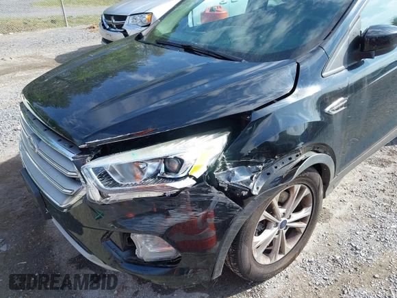2017 Ford Escape SE with VIN 1FMCU9G91HUB56073, listed as a IAAI auction lot 42130463 with 94,275 mi miles and . Bid and sale history available at carsss.com. Image 6.