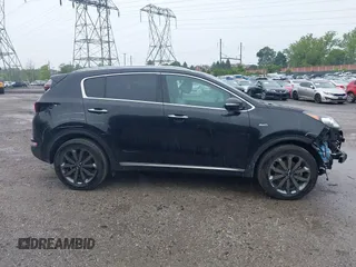 2018 Kia Sportage EX z VIN KNDPNCAC0J7441968, wystawiony jako IAAI lot #42269037 z przebiegiem 113 273 mil mil oraz . Historia ofert i sprzedaży dostępna na DreamBid. Obrazek 14.